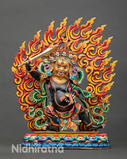 Front view of Black Manjushri statue with copper body, acrylic finish, gold face, and lotus seat