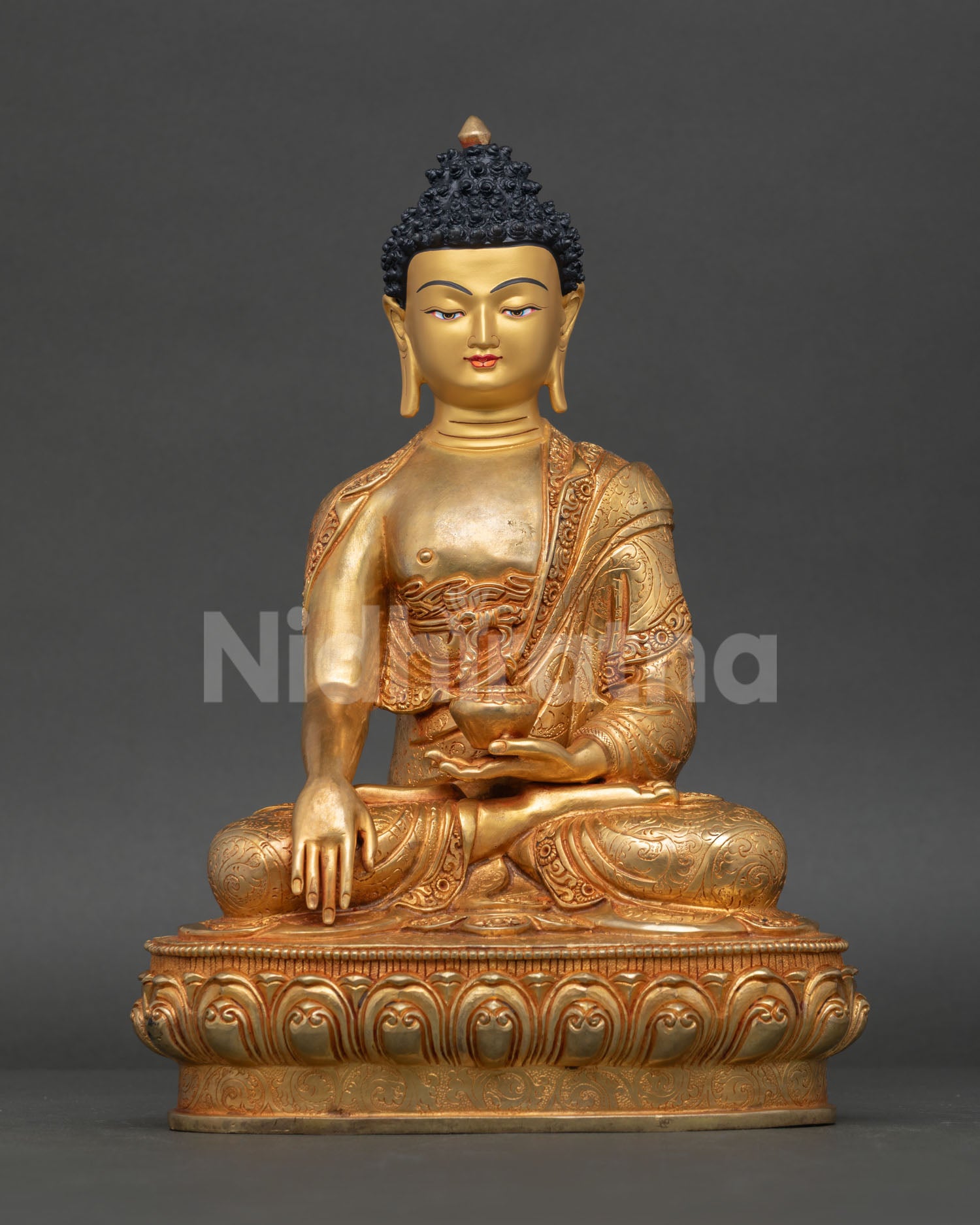 Front view of Buddha Shakyamuni statue, copper 24K gold detailing, seated on lotus pedestal, earth touching mudra, Newari craftsmanship