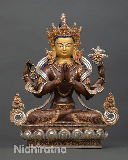 Front view of Chenrezig statue, copper oxidized finish, silver plated and gold gilded details, seated in meditation posture for altar and home decor