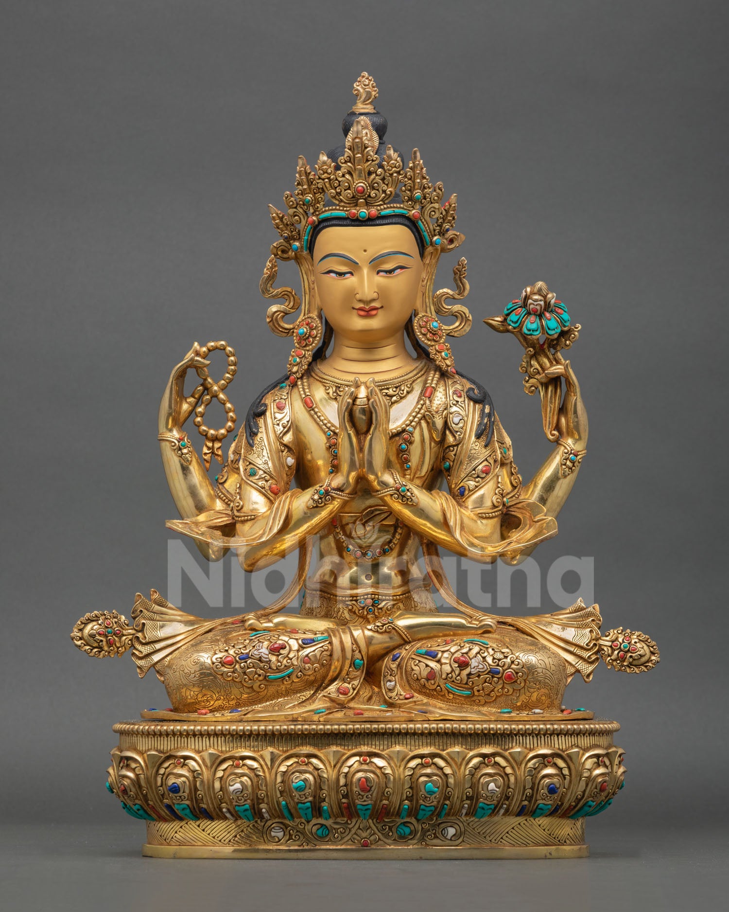 Front view of Chenrezig statue four armed Avalokiteshvara copper sculpture 24K gold gilding Nepal Buddhist altar decor compassion deity art