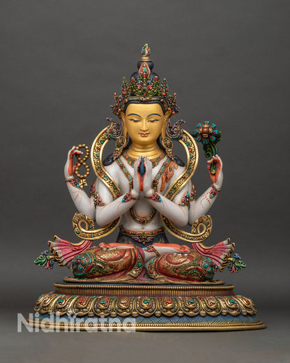 Front view Chenrezig statue, four-armed Avalokiteshvara with gold-painted face and lotus base
