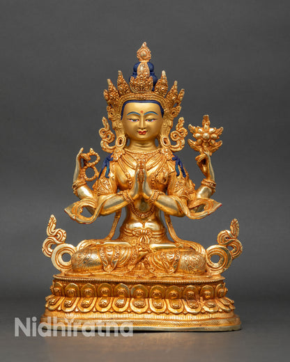 Front view of Chenrezig statue, gold accents copper Nepalese spiritual art