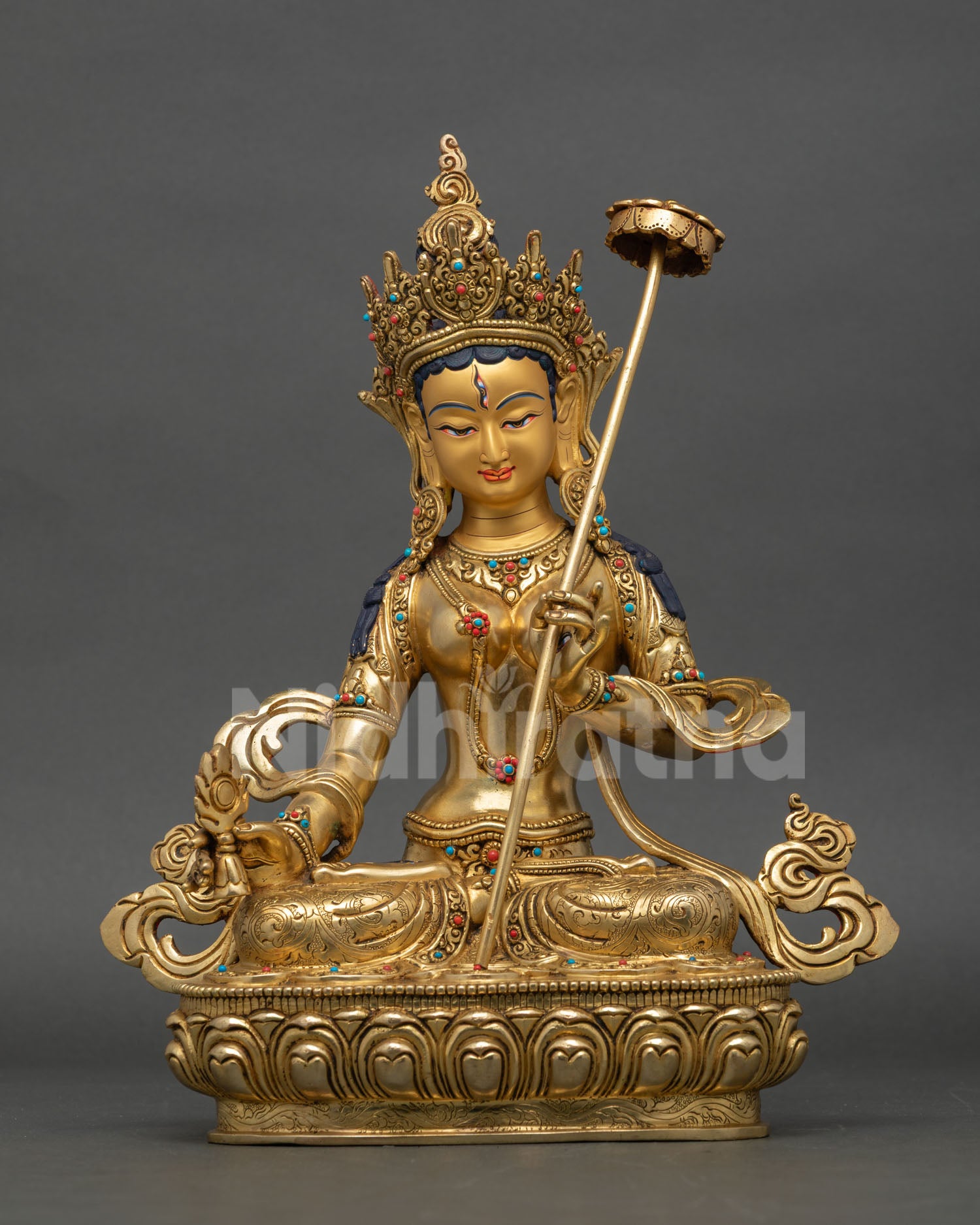 Front view of Dukar Bodhisattva statue handcrafted in copper with gold gilded face third eye, Buddhist altar and spiritual decor.