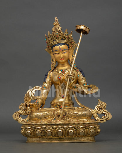 Front view of Dukar Bodhisattva statue handcrafted in copper with gold gilded face third eye, Buddhist altar and spiritual decor.