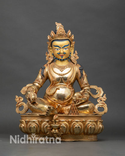Front view of Dzambhala Statue, copper with 24K gold fire-gilding, Nepalese craftsmanship