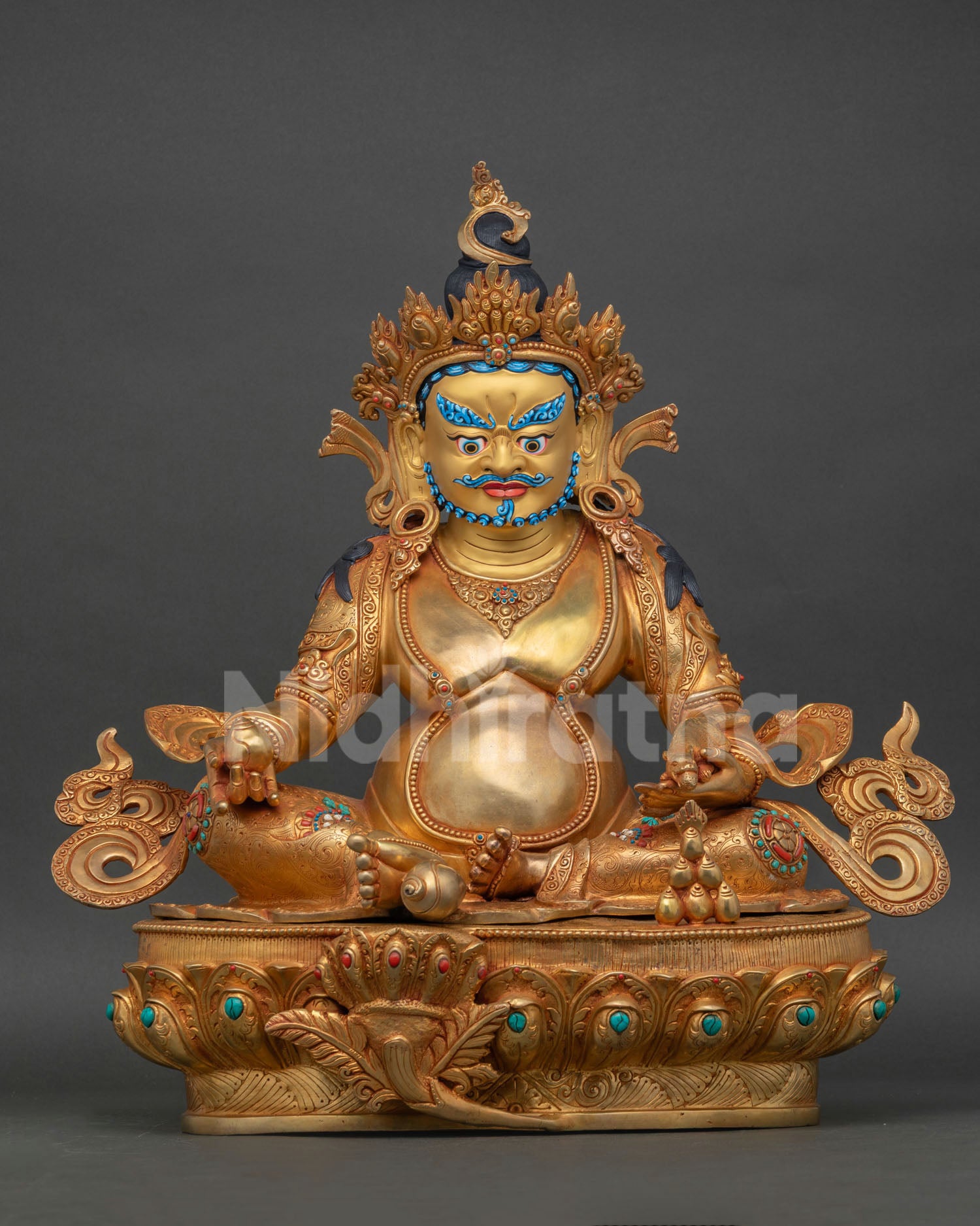 Front view of Dzambhala statue, copper, gold-painted face, seated on a lotus pedestal holding a mongoose and a citron fruit, Newari craftsmanship