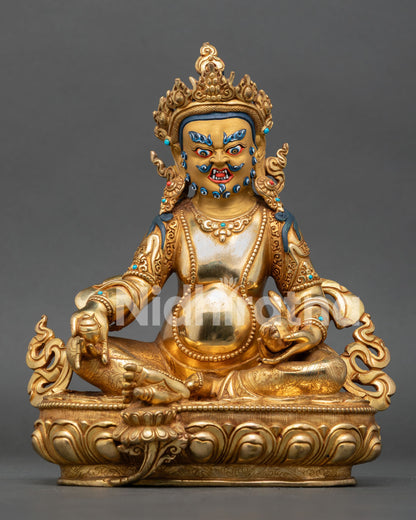 Front view of Dzambhala statue, handcrafted by Newari artisans from Nepal, gold fire gilded, fierce expression wealth deity