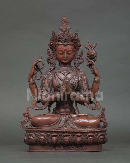 Front view of Four Armed Chenrezig Avalokiteshvara statue in oxidized copper finish