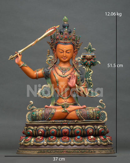 Front view of gold-gilded copper Manjushri Statue with gemstone-studded crown