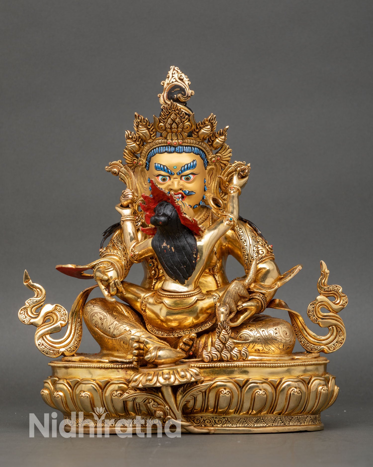 Front view of Green Dzambhala Yab Yum statue made of copper and gold gilded, a wealth deity from Nepal.