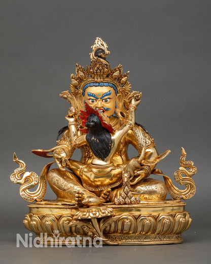 Front view of Green Dzambhala Yab Yum statue made of copper and gold gilded, a wealth deity from Nepal.