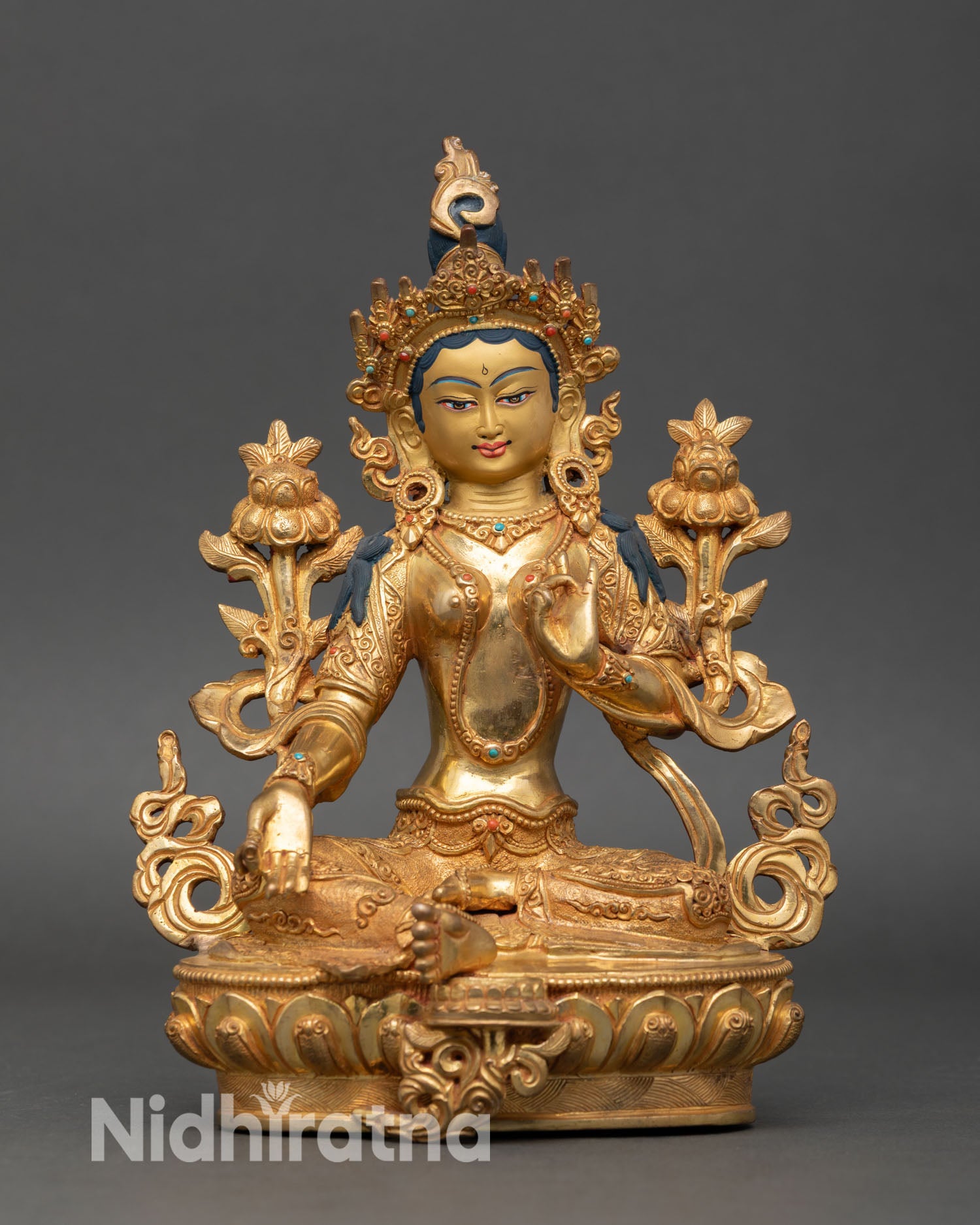 Front view of Green Tara statue, handcrafted in Patan, Nepal, copper sculpture, 24K gold fire gilded hand-painted face, Buddhist deity