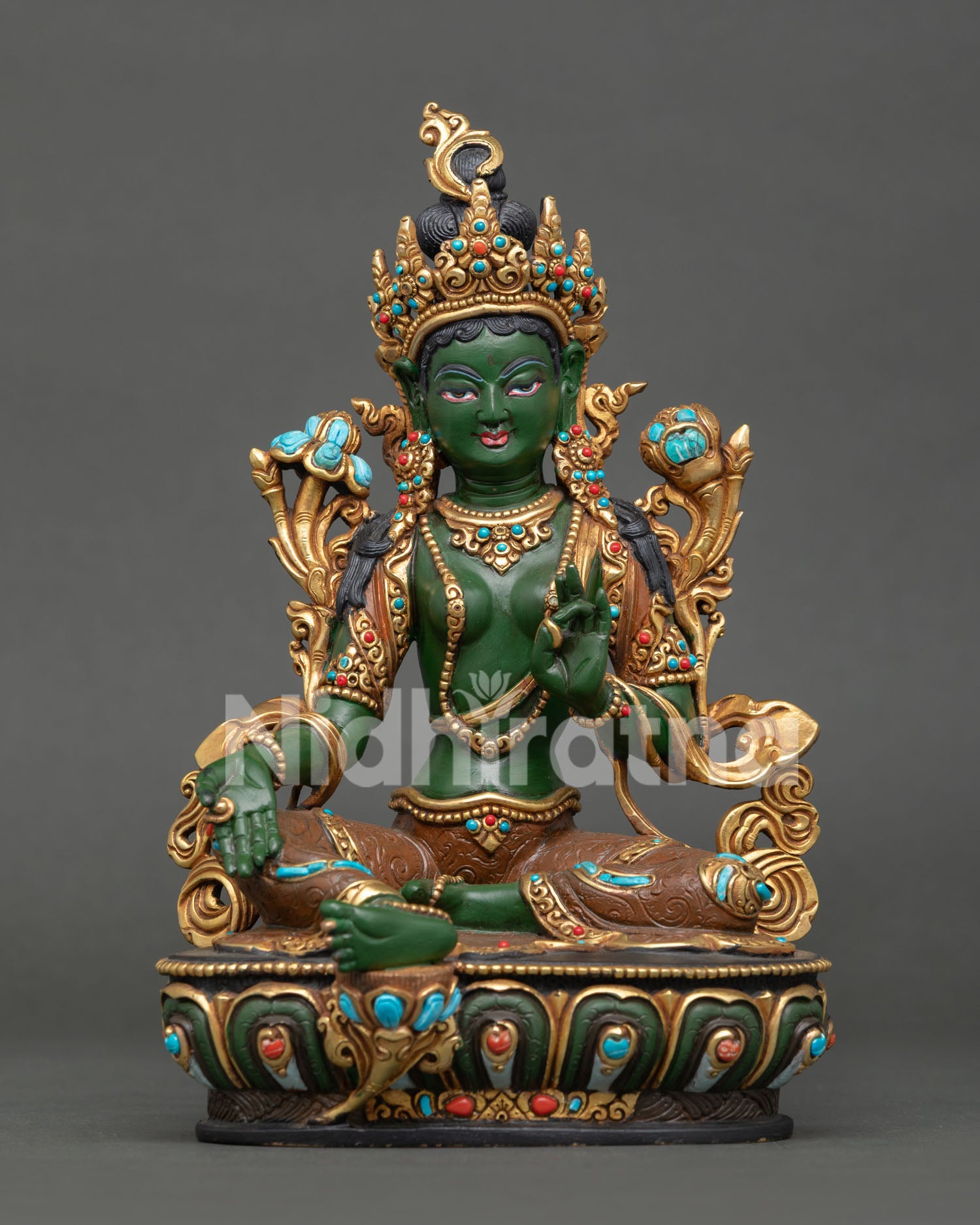 Front view of Green Tara statue with acrylic colors, gold gilding and semi-precious stones