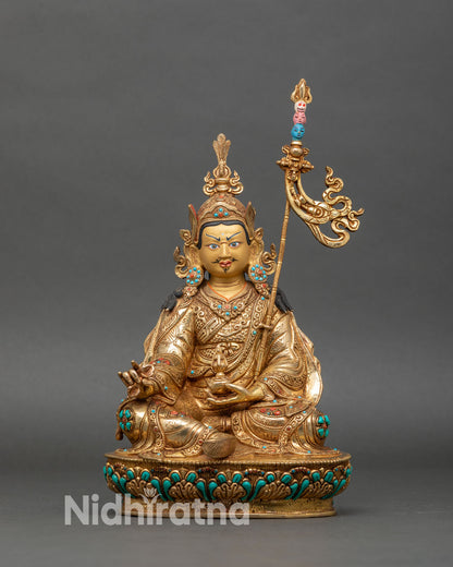 Front view of Guru Rinpoche statue, copper with gold fire-gilding on lotus pedestal