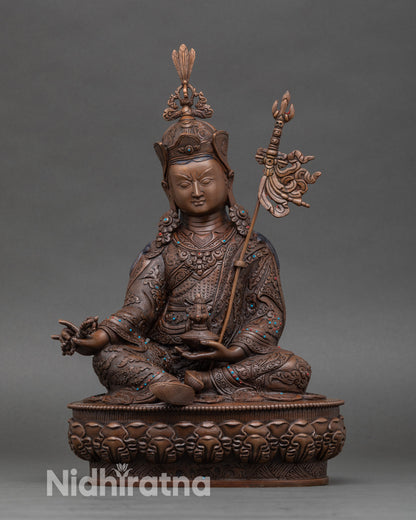 Front view of Guru Rinpoche statue, handcrafted Newari artisan Patan Nepal copper turquoise coral lotus pedestal