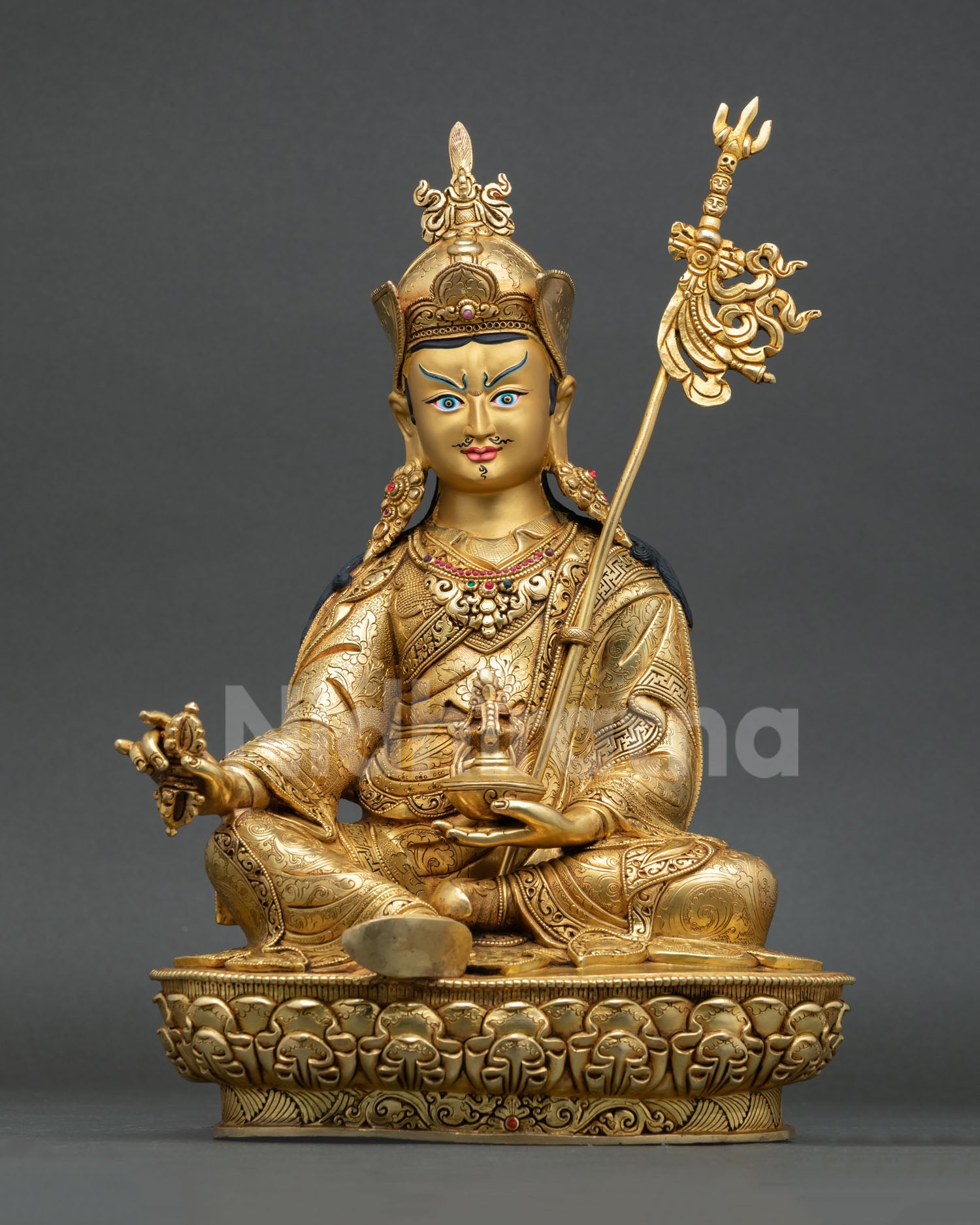 Front view of Guru Rinpoche statue with 24K gold gilding copper craftsmanship semi precious stone inlays Nepal