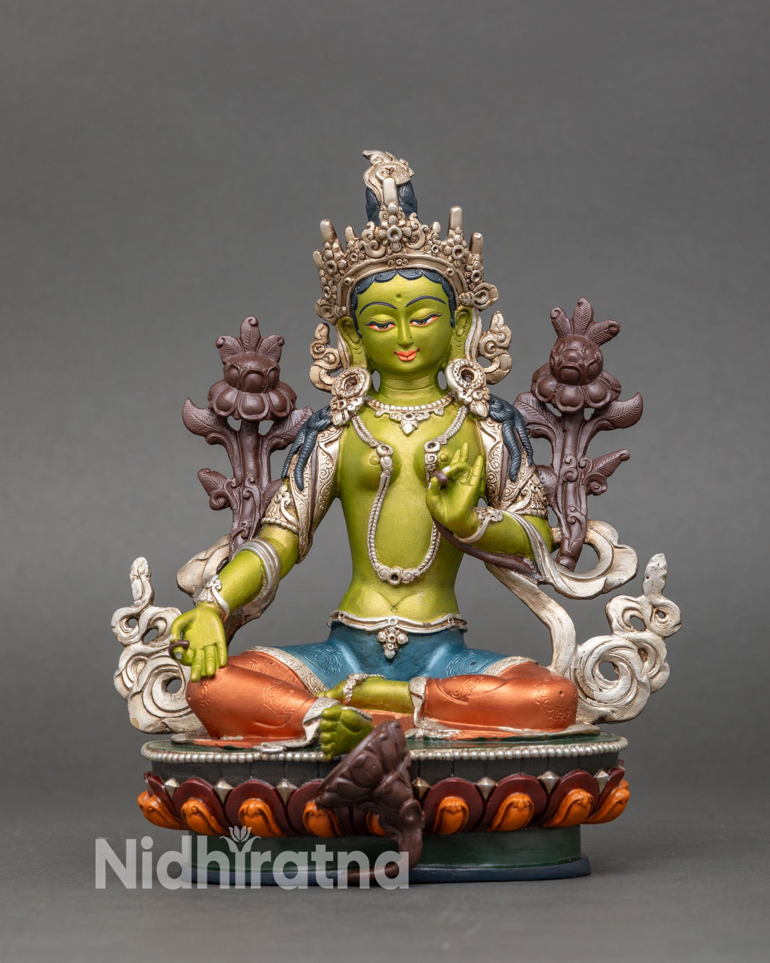 Front view of handcrafted Green Tara statue, copper and silver Nepalese Buddhist art