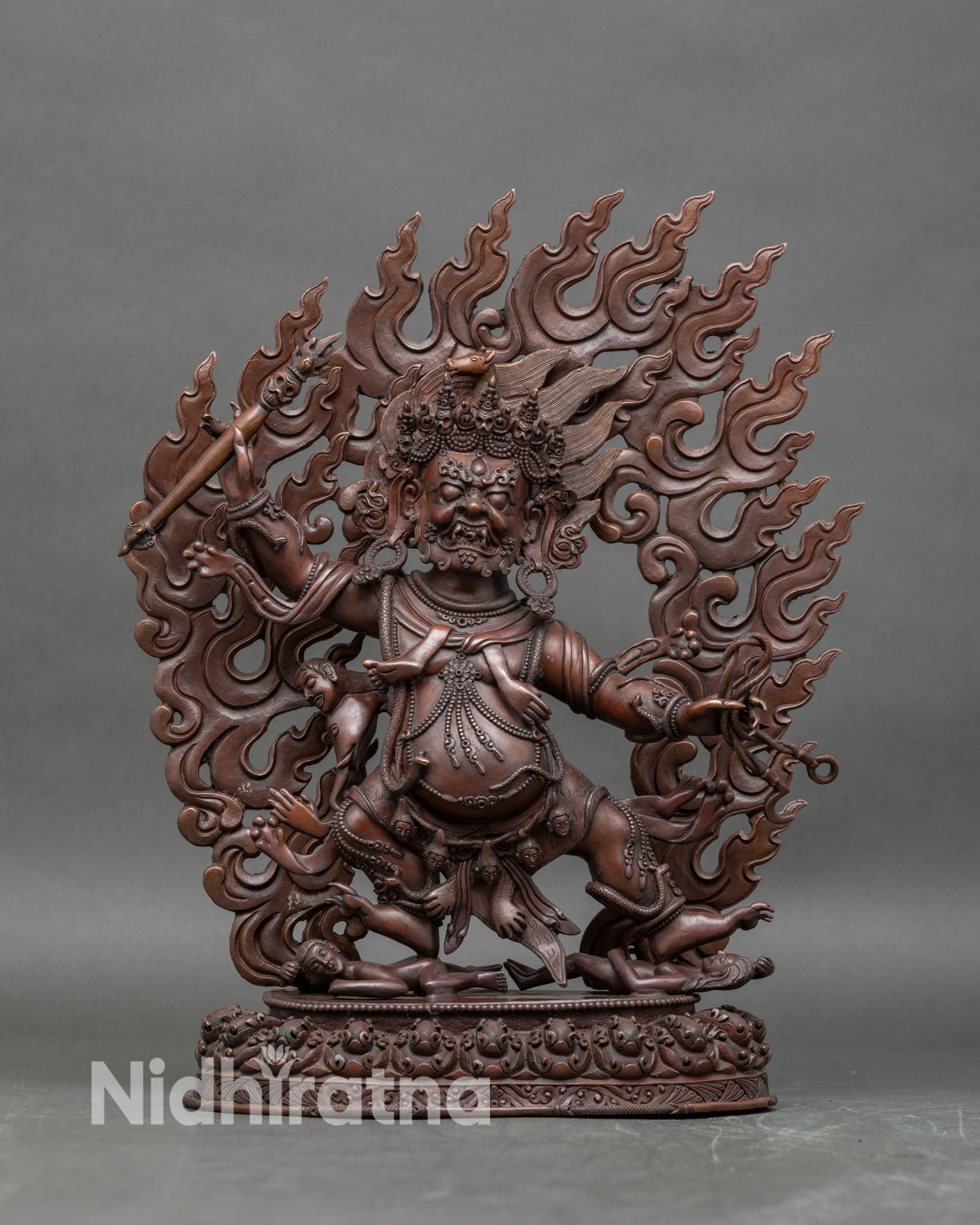 Front view Hayagriva statue oxidized copper wrathful deity lotus seat Himalayan sculpture