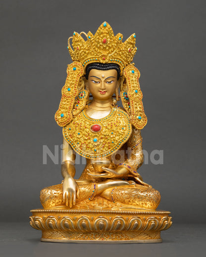 Front view of Jowo Rinpoche Buddha statue, handcrafted in Nepal with copper gold fire gilding and hand painted face, seated on lotus pedestal