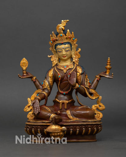 Front view of Laxmi statue handmade Nepalese copper goddess of wealth seated on lotus throne with gold gilded detailing and semi precious stones