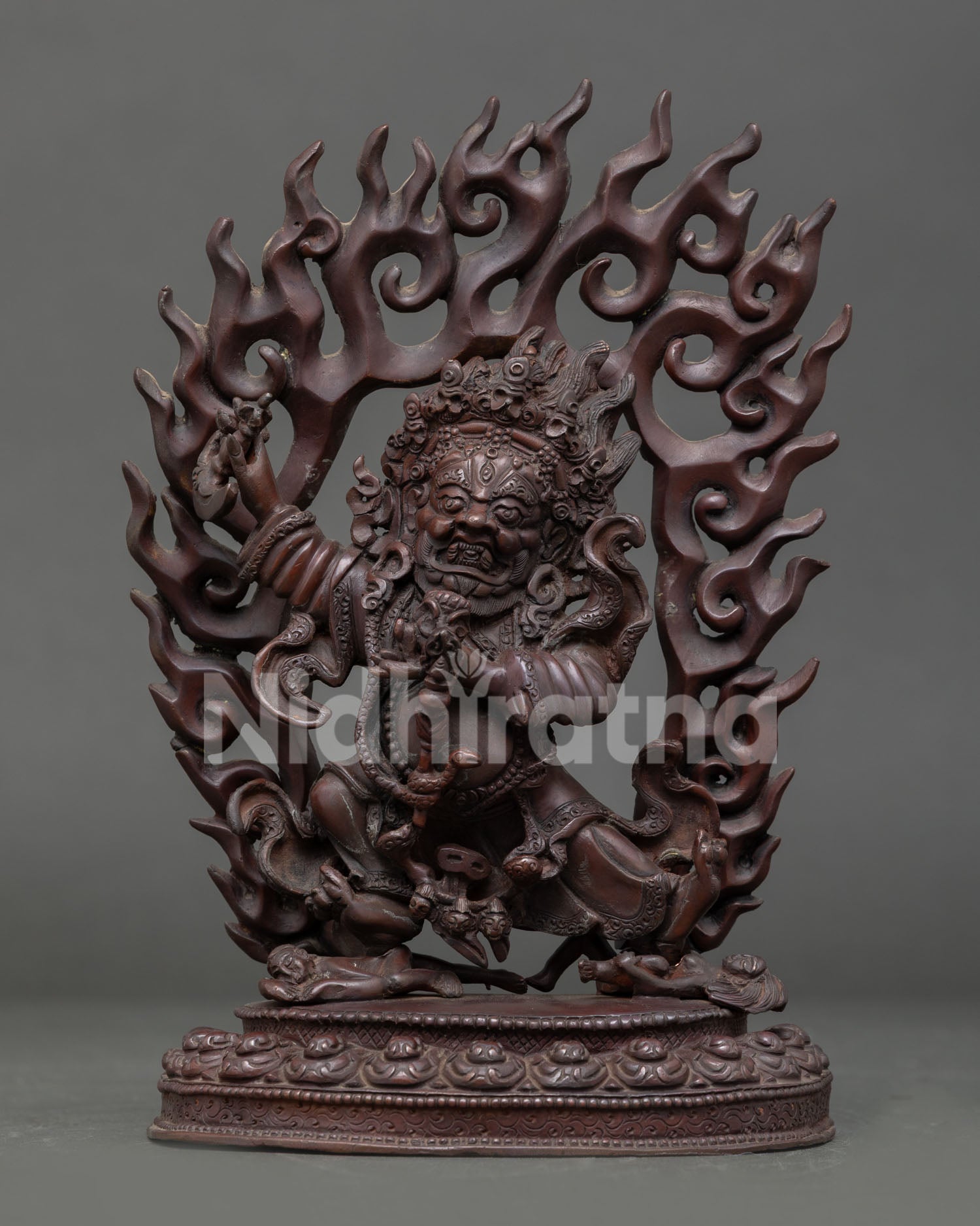 Front view of Mahakala Bernagchen statue, handcrafted in Nepal by Newari artisans in copper with oxidized finish, wrathful protector deity sculpture