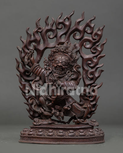 Front view of Mahakala Bernagchen statue, handcrafted in Nepal by Newari artisans in copper with oxidized finish, wrathful protector deity sculpture