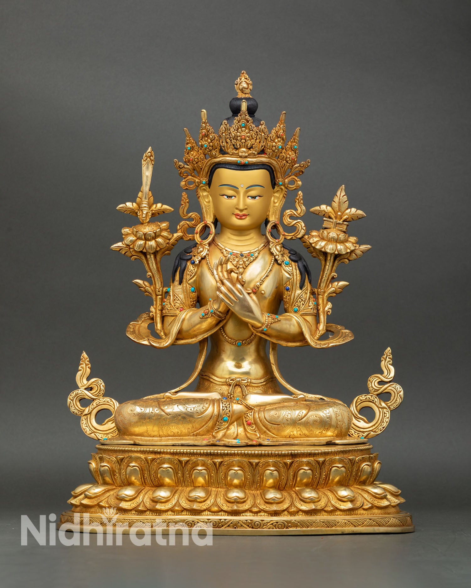 Front view of Manjushree statue Nepal copper gold gilded gold painted face semi precious stones Dharmachakra mudra lotus throne Buddhist art