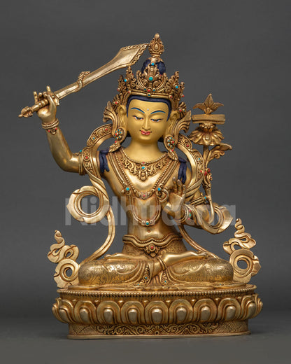 Front view of Manjushri Statue, fire-gilded copper Bodhisattva of Wisdom seated on a lotus throne