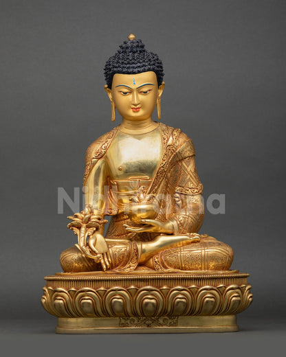 Front view of Medicine Buddha statue handcrafted in Nepal with 24K gold gilding copper and healing altar decor