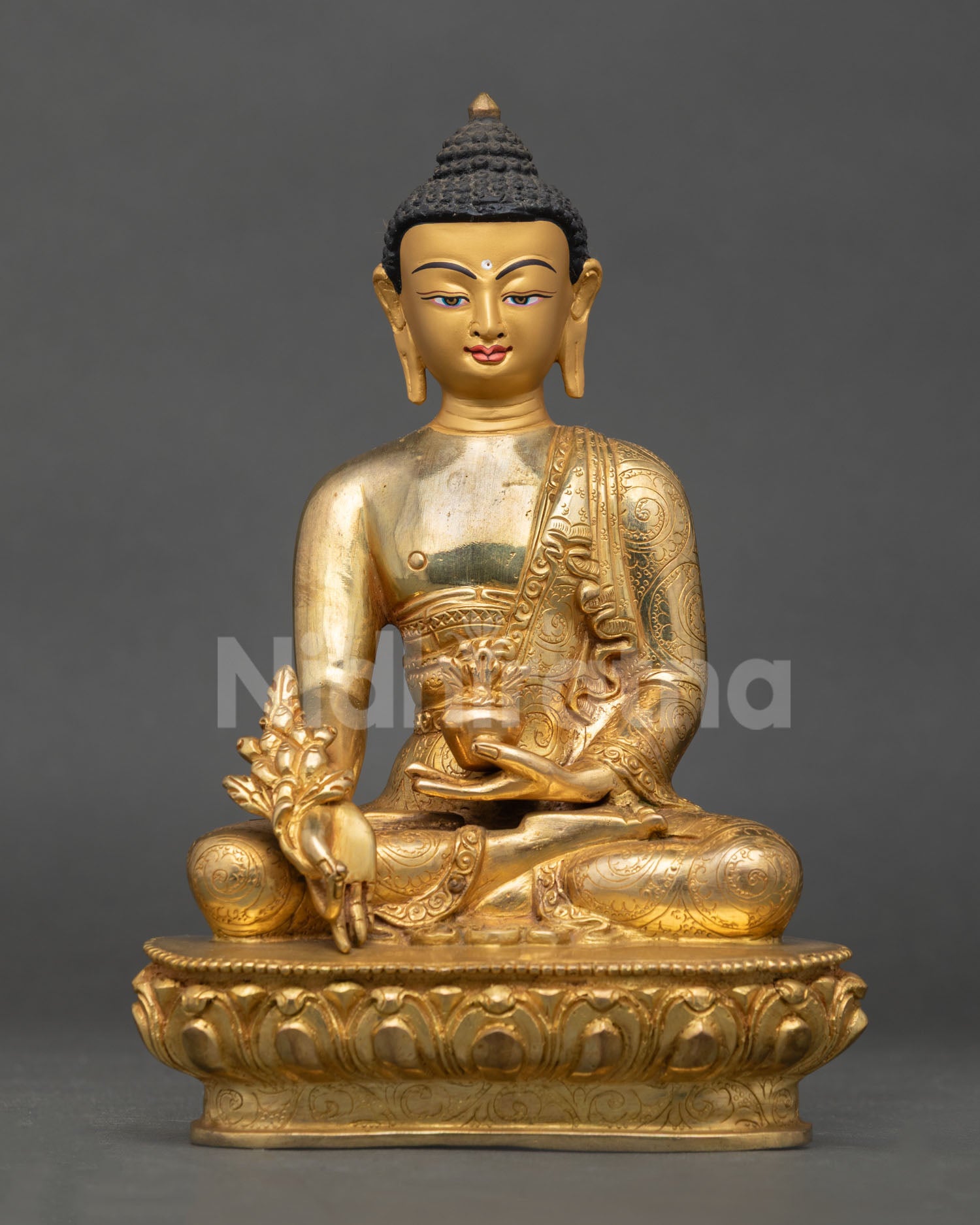 front view medicine buddha statue in copper with gold gilding on lotus throne