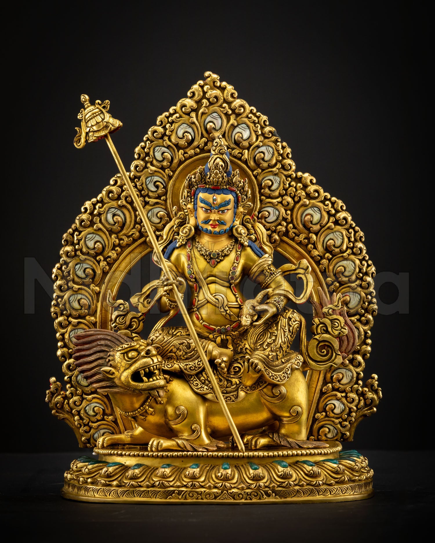 Front view of Namtoshe wealth deity statue handcrafted in copper with 24K gold fire gilding seated on snow lion and lotus throne with halo and semi precious stones