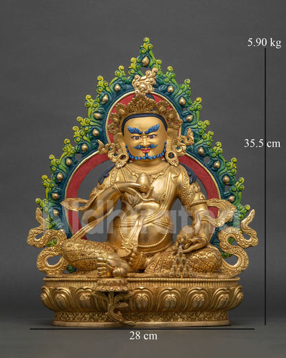 Front view of 24K gold fire-gilded handmade Nepal Yellow Dzambhala statue on lotus base.