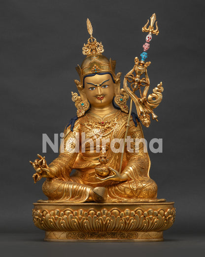 Front view of 24K gold gilded Guru Rinpoche Padmasambhava statue handcrafted in Nepal.