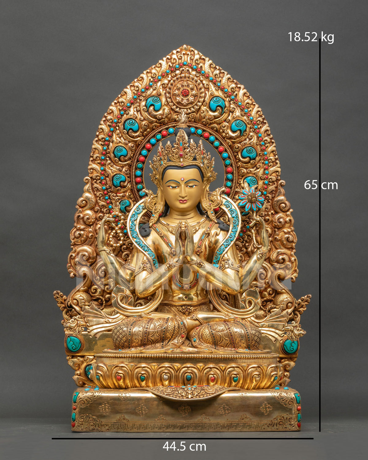 Front view of 25 inch gold fire-gilded Chenrezig statue from Nepal with floral halo