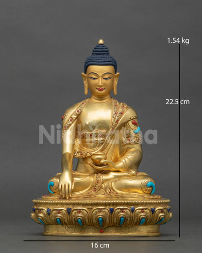 Front view of a copper Shakyamuni Buddha statue on a lotus pedestal for meditation decor.