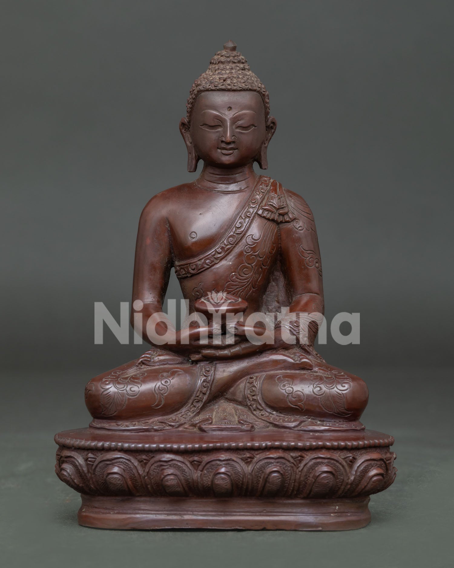 Front view of Amitabha Buddha Statue handcrafted from oxidized copper with lotus pedestal and alms bowl.