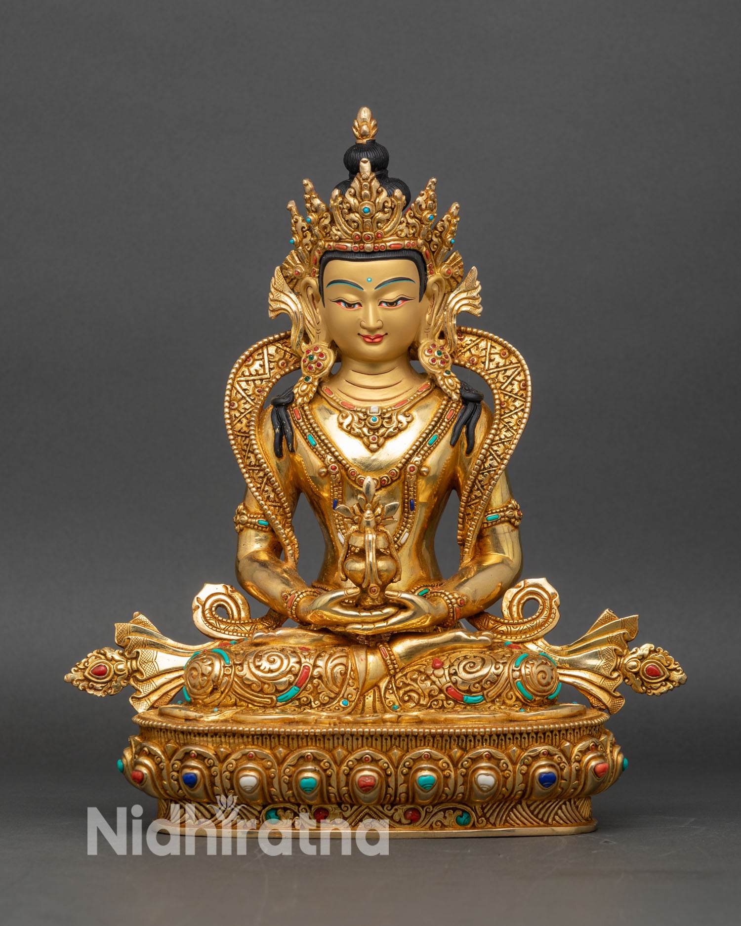Front view of Amitayus statue handcrafted in Nepal with gold gilded copper and semi-precious stones