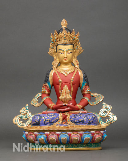 front view of amitayus statue holding kalasha vase with gold-painted face