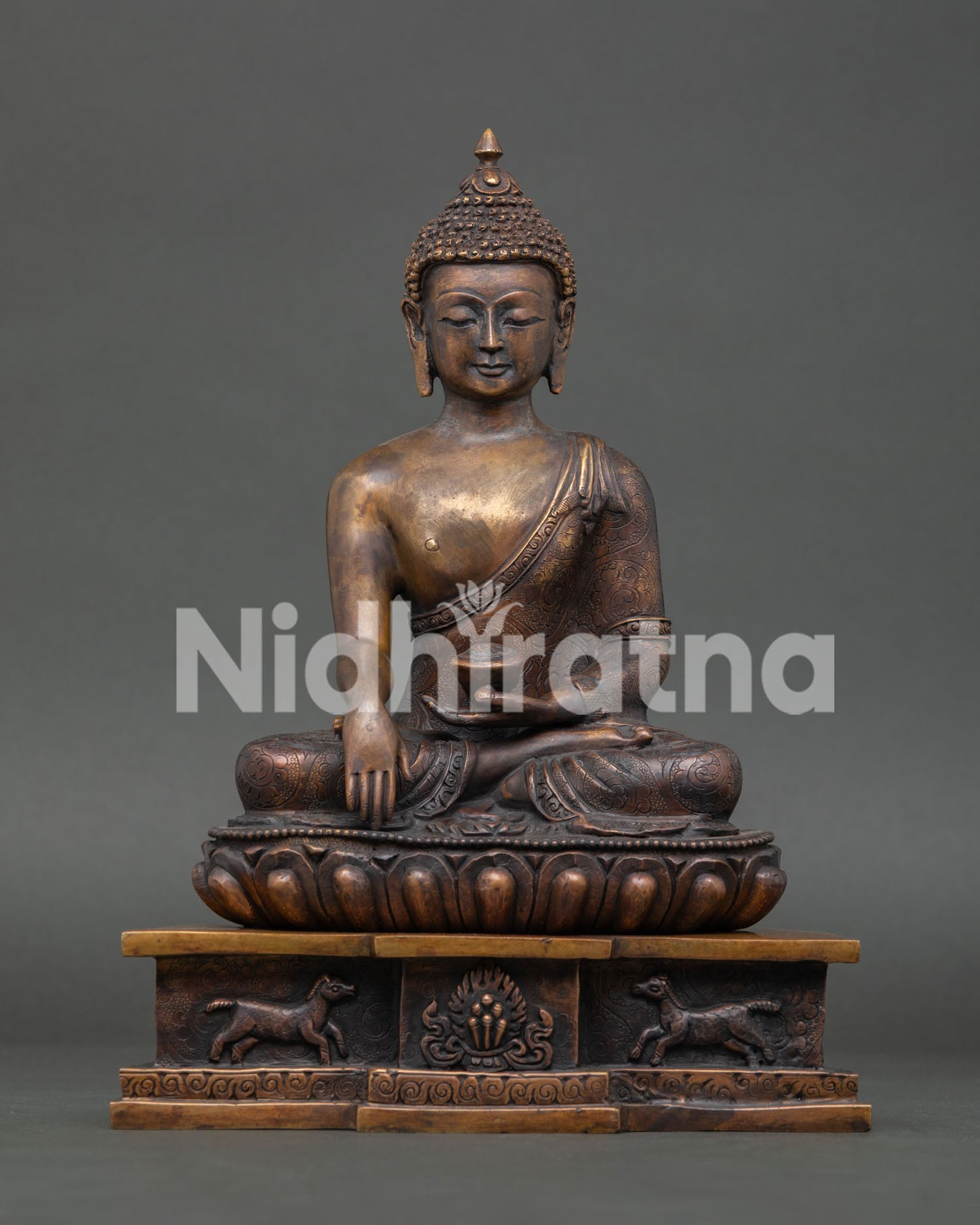 Front view of antique finished Shakyamuni Buddha statue handmade in Nepal with oxidized copper