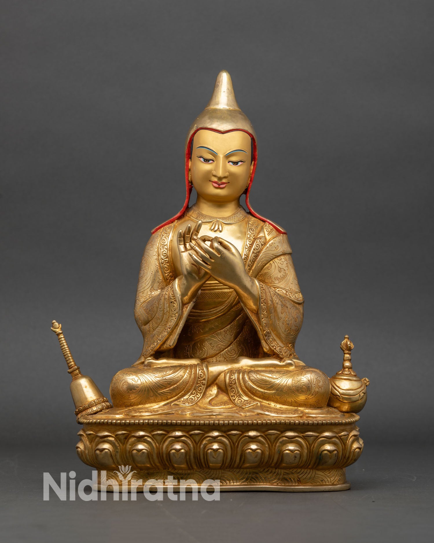 Front view of Atisha Dipankara statue lotus pedestal gold gilded copper Nepal