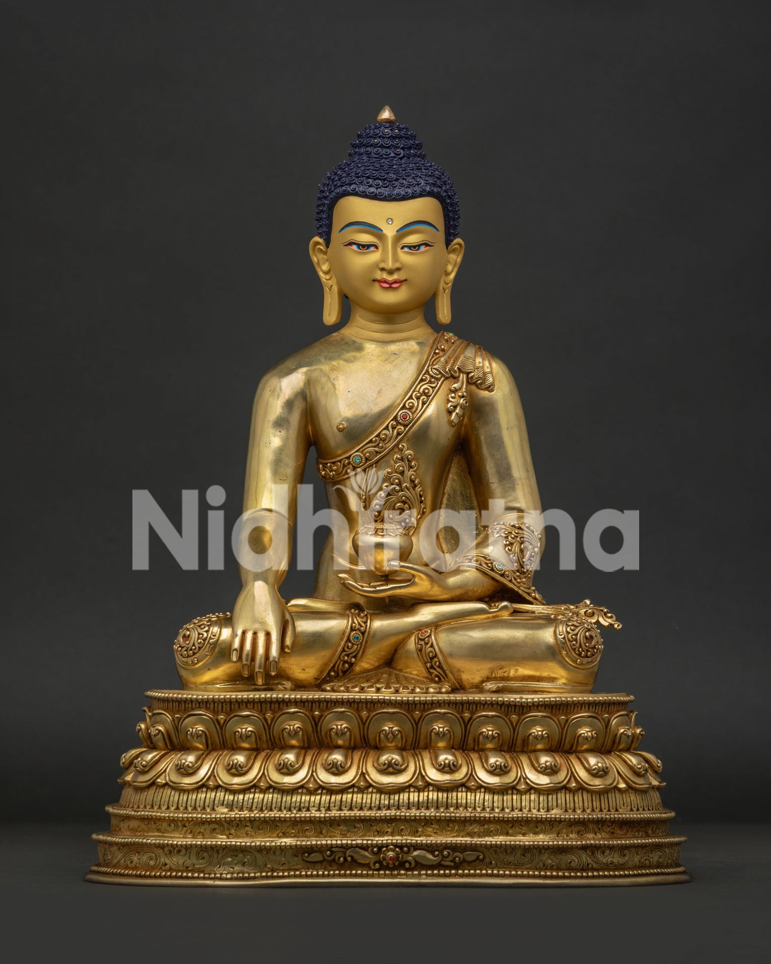 Front view of authentic Shakyamuni Buddha statue handcrafted in Nepal with gold gilded copper