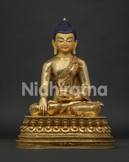 Front view of authentic Shakyamuni Buddha statue handcrafted in Nepal with gold gilded copper
