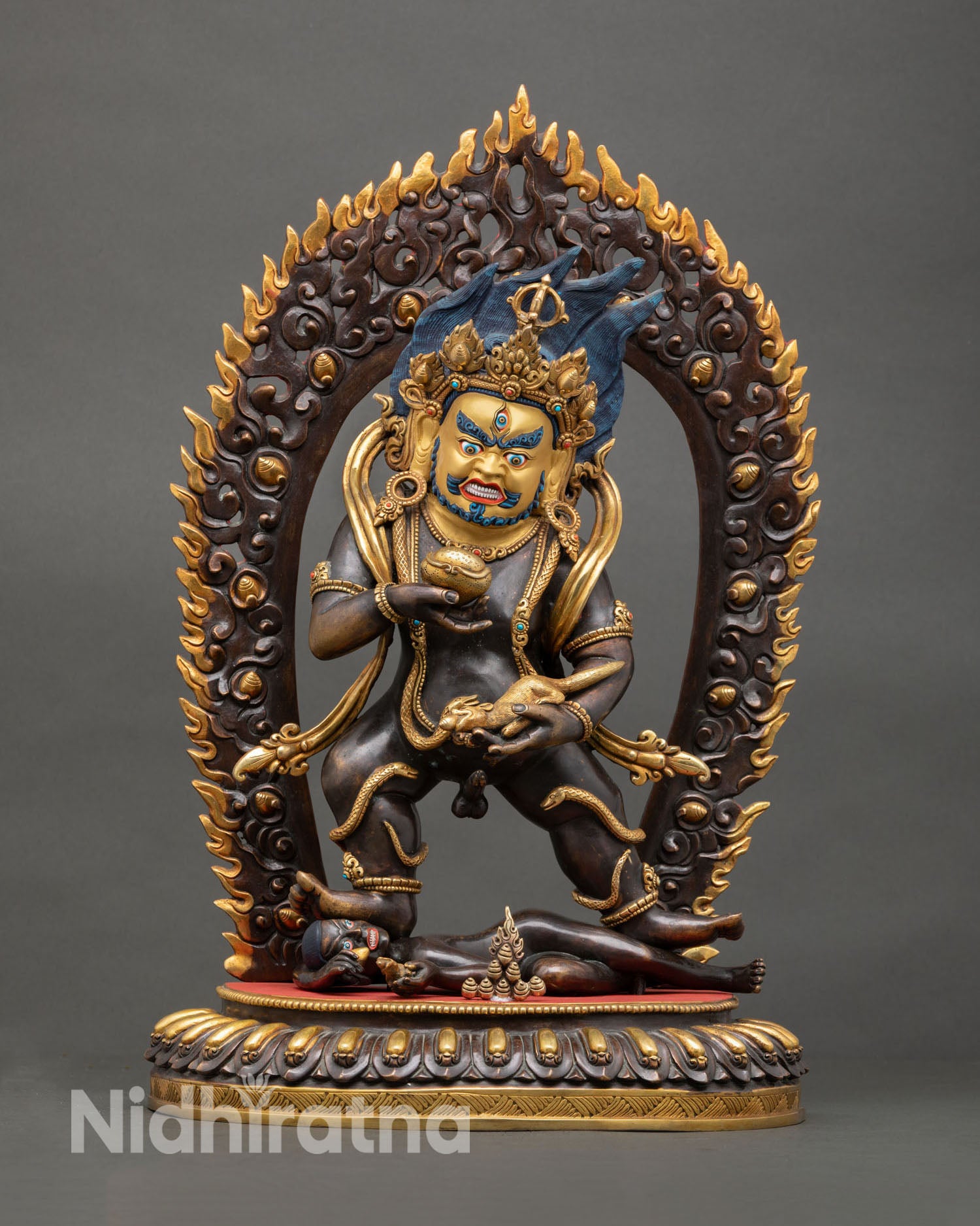 Front view of Black Dzambhala statue handcrafted in Nepal, copper oxidized finish, wrathful wealth deity sculpture