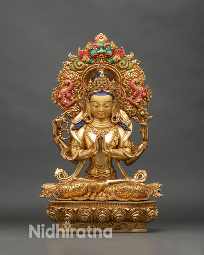 Front view of Chenrezig statue, four-armed copper with gold-painted face Nepalese art
