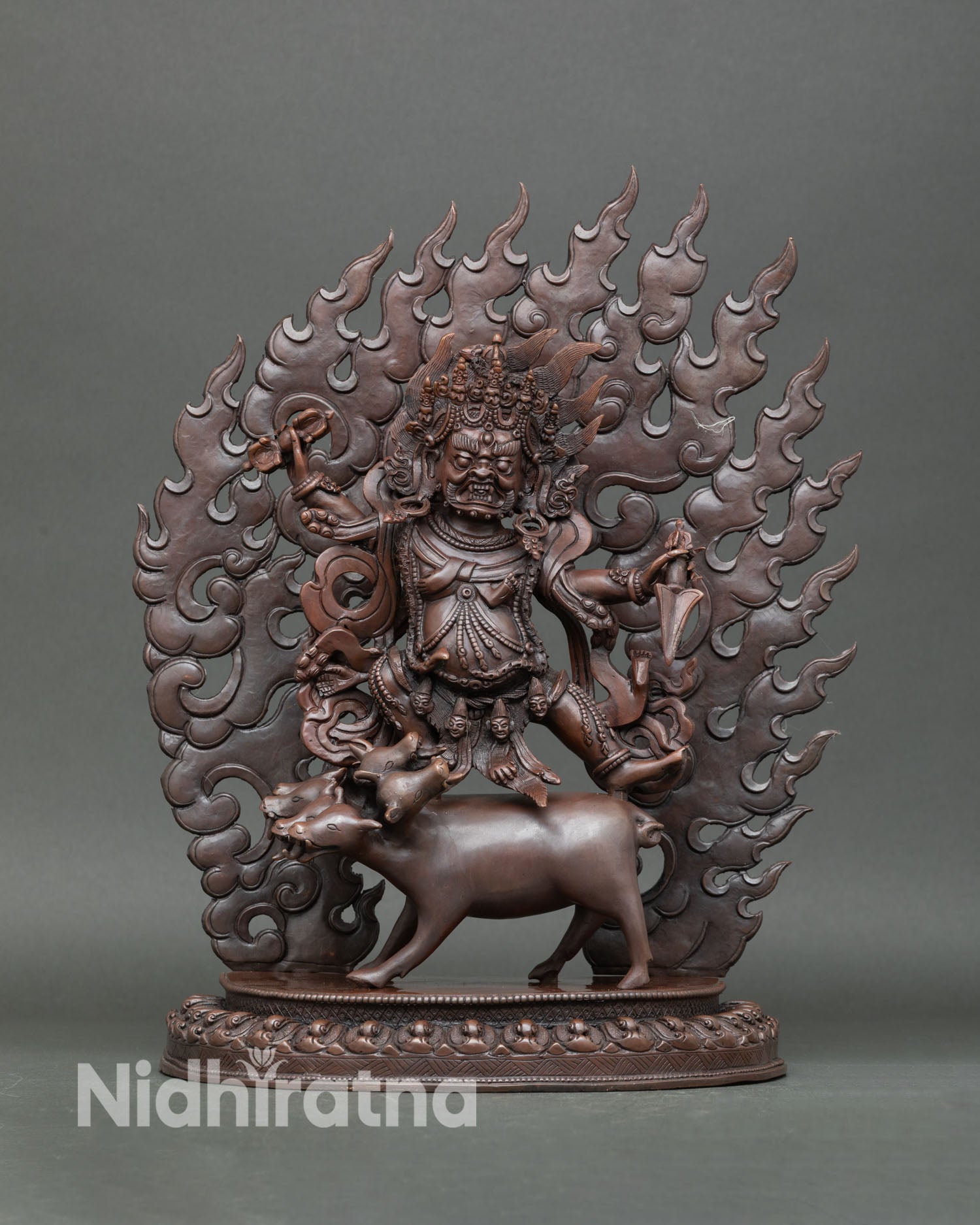 Front view of Dorje Gotrab statue handcrafted Nepalese copper wrathful deity sculpture with oxidized finish
