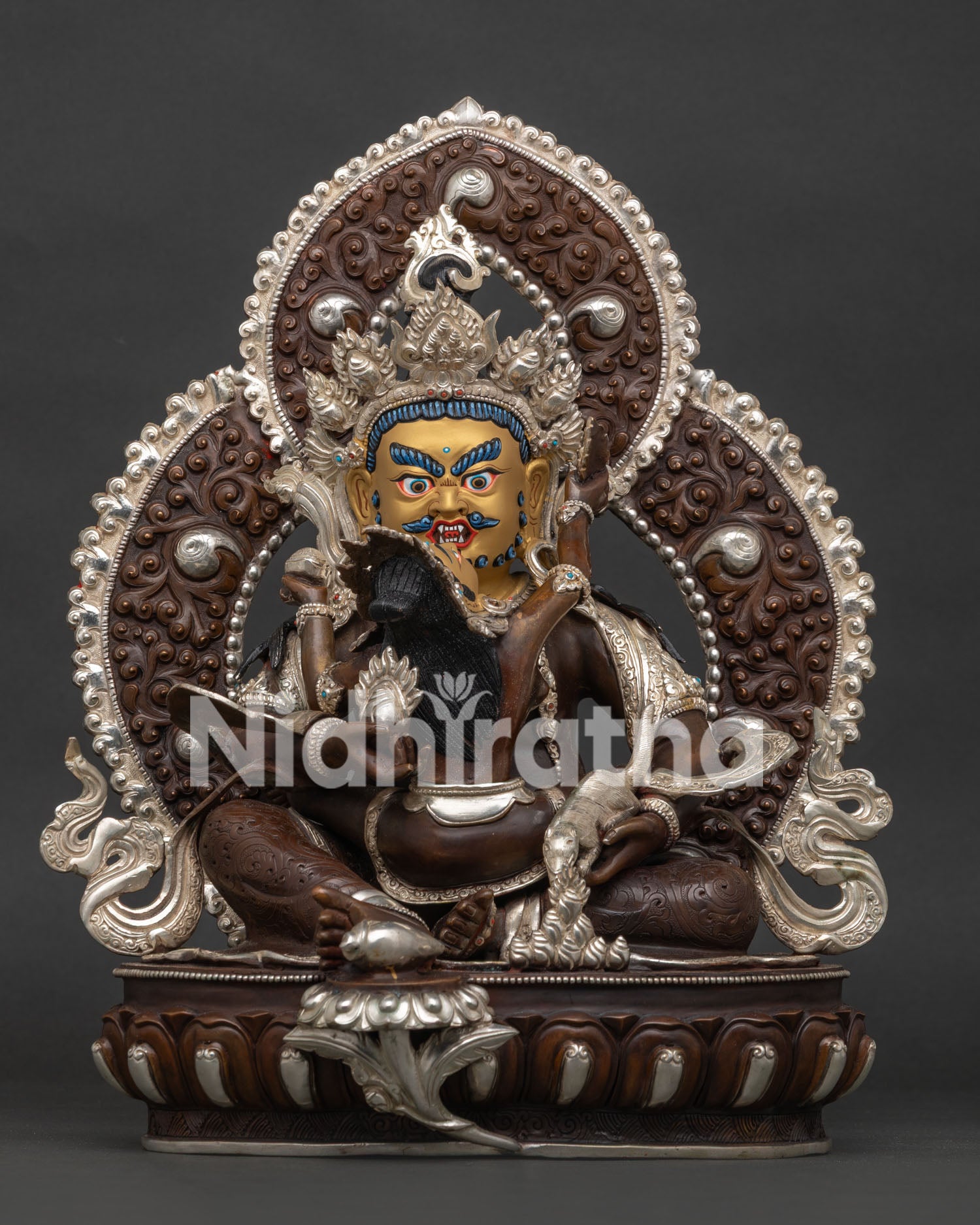 Front view of Dzambhala Yab-Yum statue with consort and radiant halo