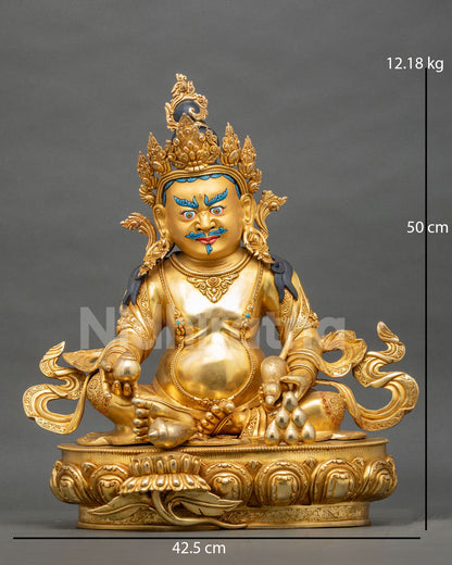Front view of gold fire gilded copper Dzambhala sculpture handcrafted by master Newari artisans.