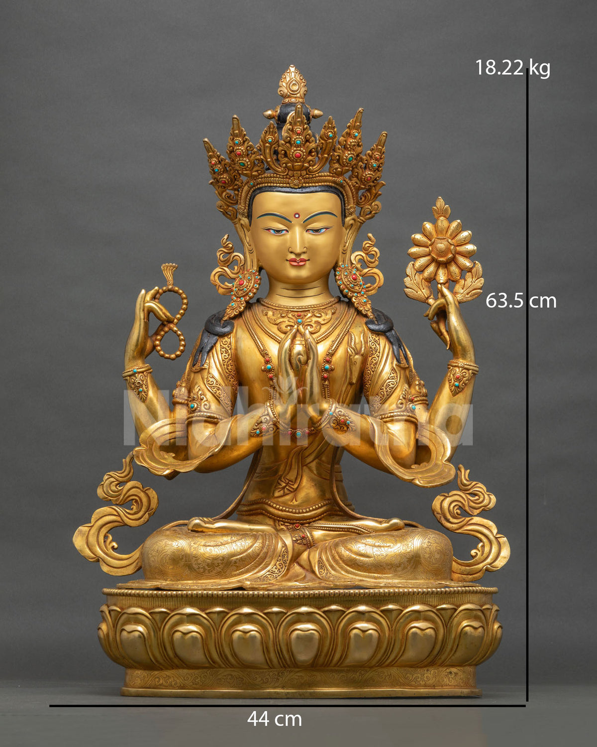 Front view of gold four-armed Chenrezig statue seated on lotus base, handmade Buddhist decor