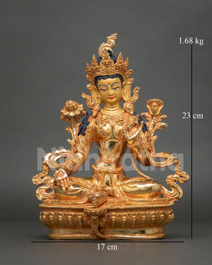 Front view of gold-gilded Green Tara statue on lotus base, handmade copper from Nepal