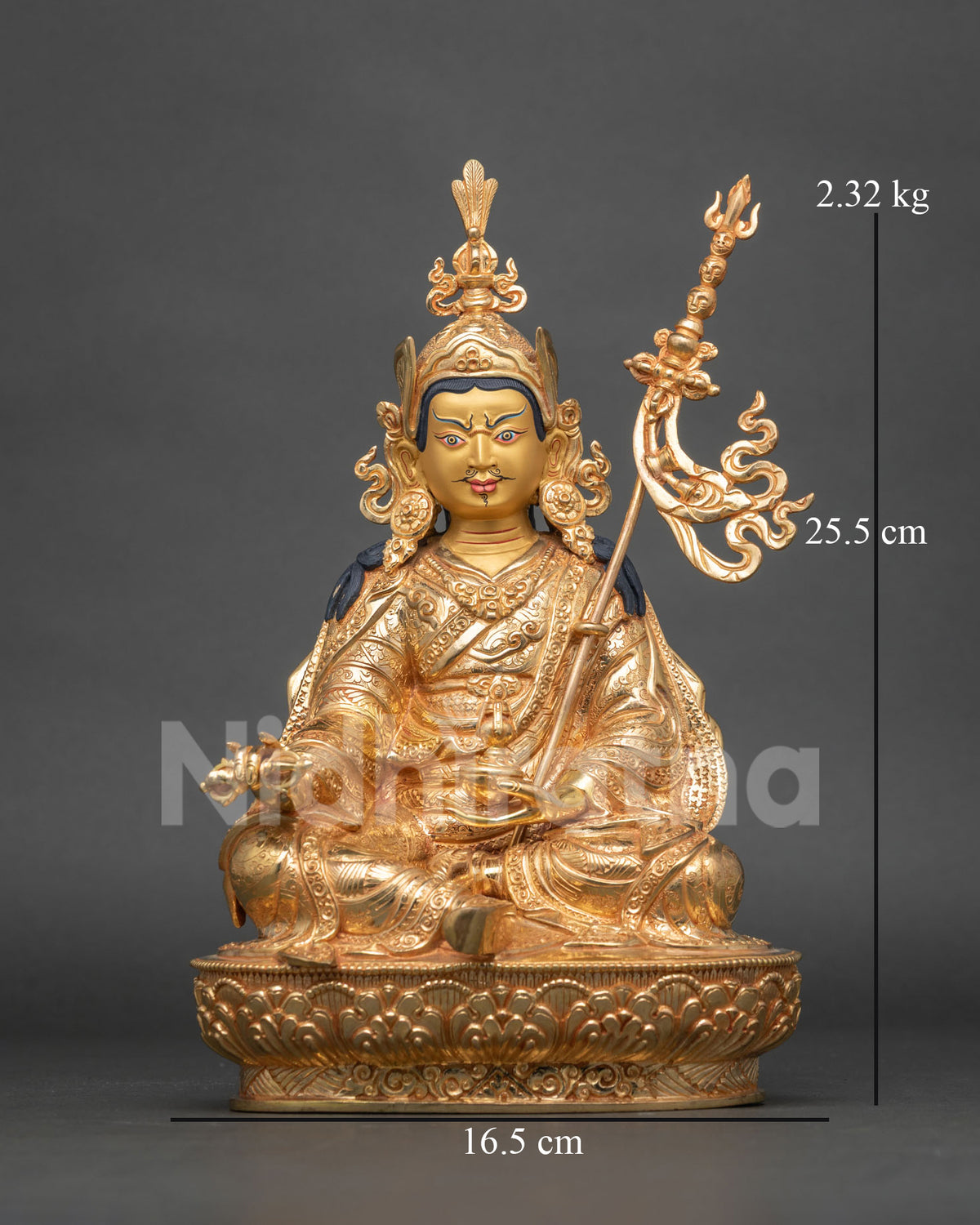 Front view of gold Guru Rinpoche statue on lotus base with trident and skull cup